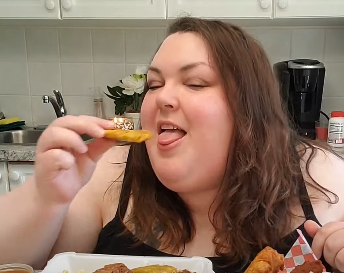 chantaltryinghaitianbite.jpg