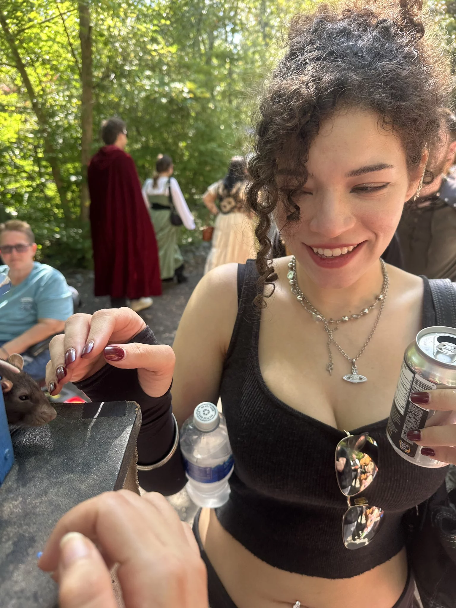 Renaissance Venti petting a rat